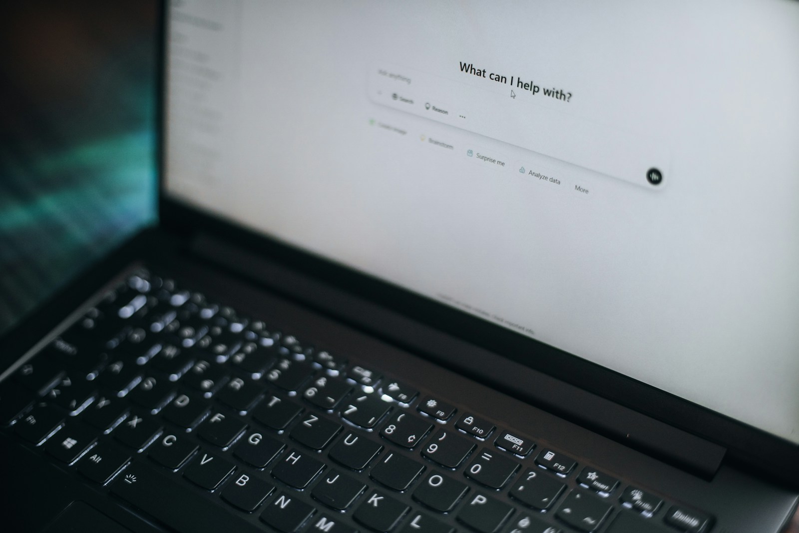 A laptop showing an AI assistant waiting for creator review.